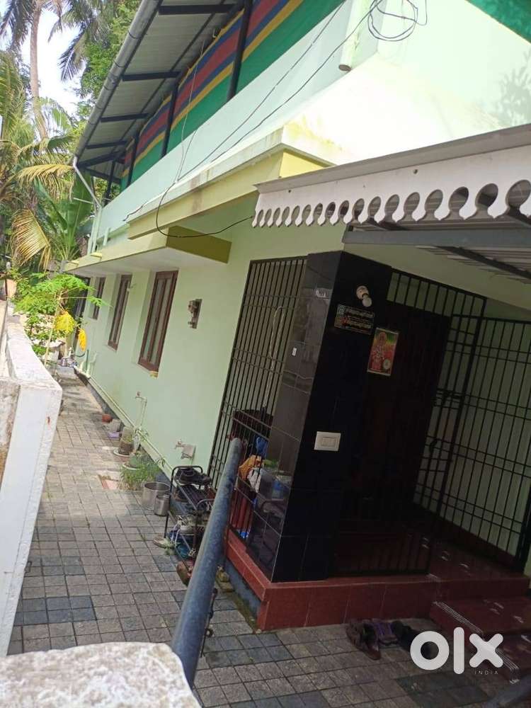 2 cents of plot with 900 sqft 2 bhk house for sale at Tripunithura.