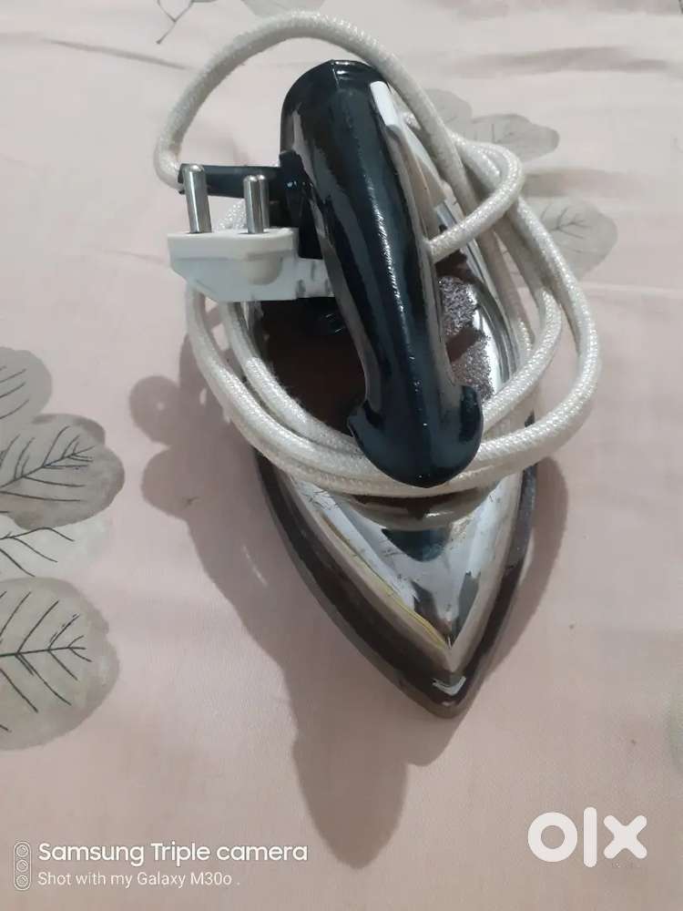 Iron to press clothing
