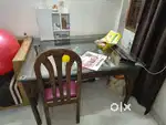 Glass dining with chairs