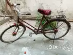 Bicycle (maroon/red colour)