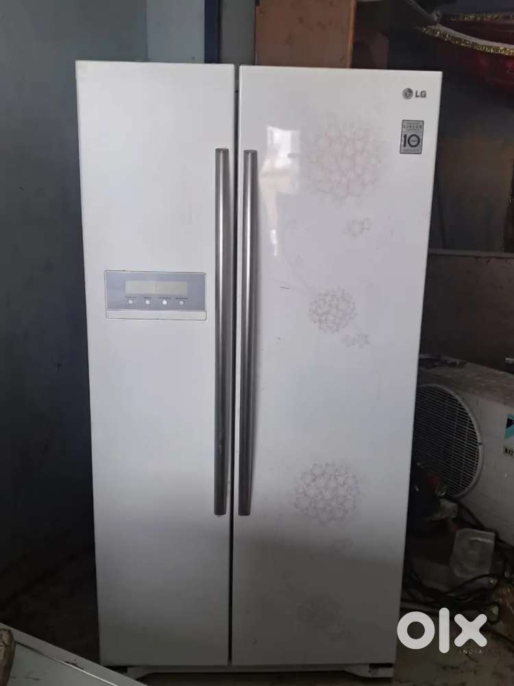 LG SIDE BY SIDE FRIDGE GOOD WORKING CONDITION RS 21000