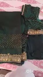 Saree with Stitched blouse and Peticoat.