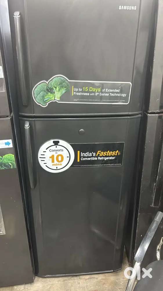 Samsung double door fridge good condition with warranty 1 year old