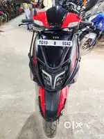 Warm Red and black Ntorq 125 year 2024