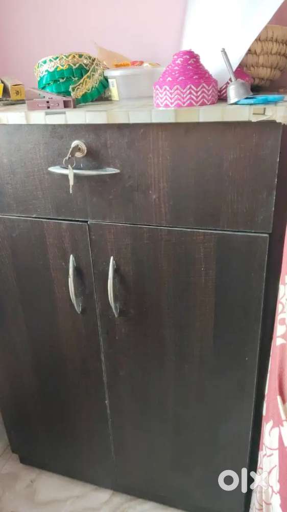 Wooden shoe rack in well maintained condition