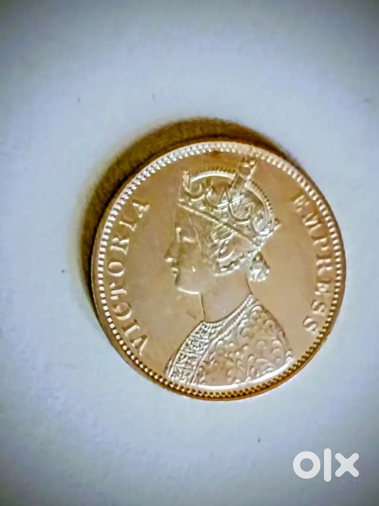 1877 Victoria Empress One Rupee Silver Coin in UNC/ Mint condition.