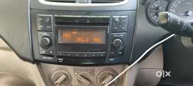 Swift dzire music system company fitting