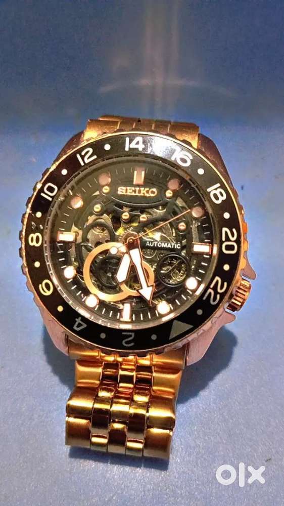 SEIKO: Automatic sekeleton dial, golden Jubilee strap watch