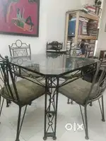 Wrought iron 4 seater  dining table with toughened glass top