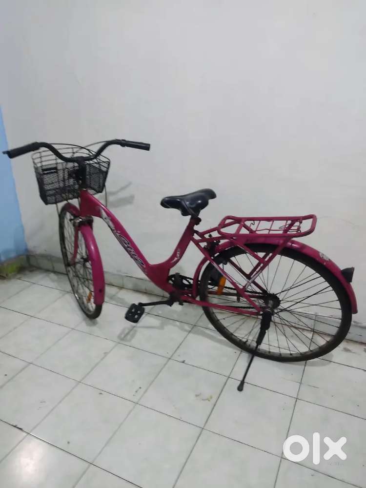 Ladies cycle with basket and bell