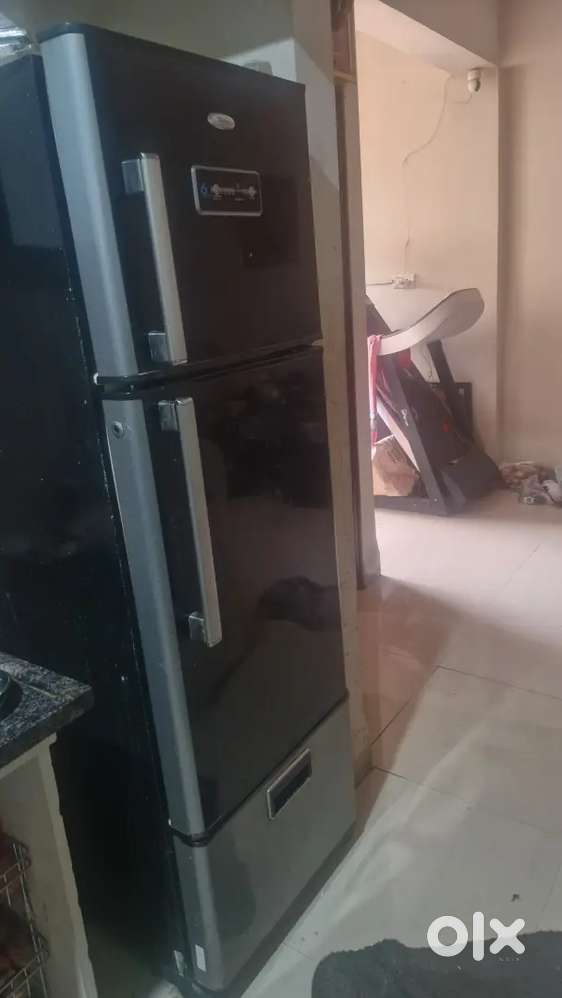 Triple door fridge is in good working condition,