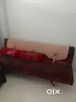Long sitting Sofa and wooden dress hanger