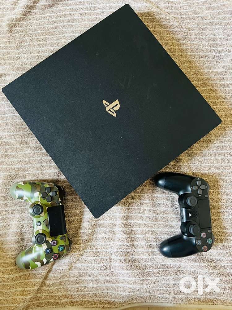 PS4 pro (1-Tb) along with 2 controllers.