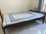 Wooden double bed