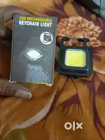 Cob rechargeable keychain light features; strong magnet.carabiner.