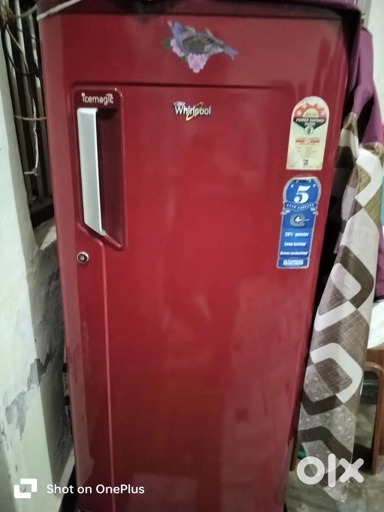 Whirlpool refrigerator in very best condition with free cover