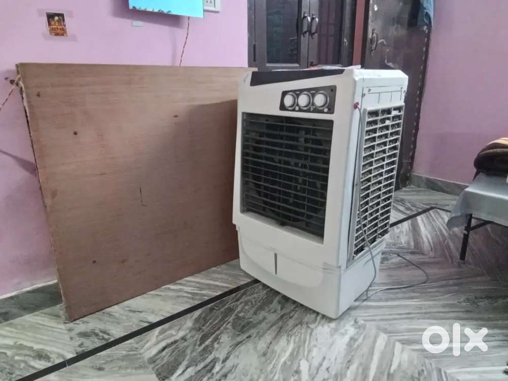 7 month old cooler and bed(bengali colony, santnagar)