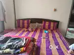 6 by 6 double wood bed top condition and 6 seater sofa set