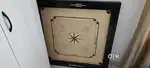 Champion carrom board