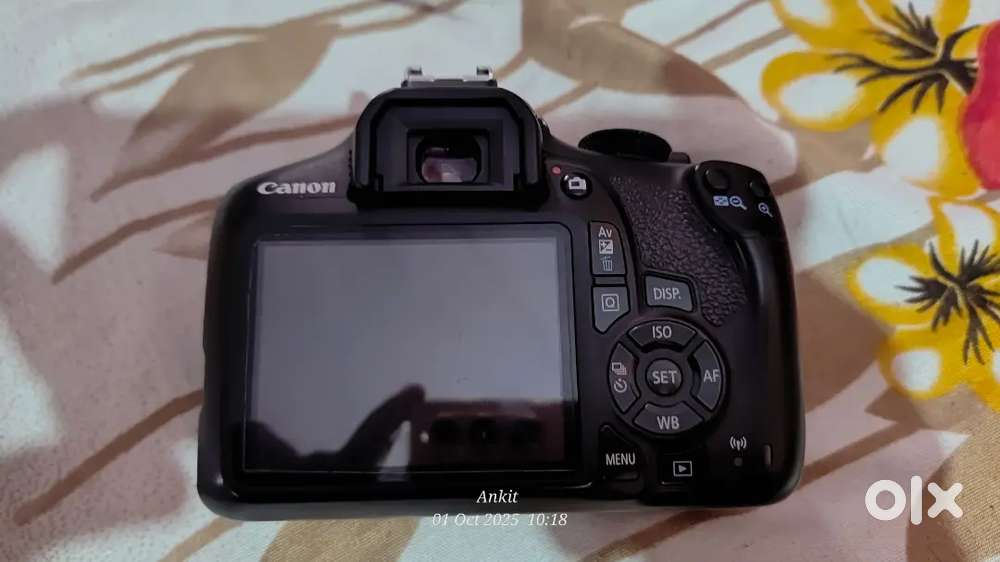 Canon 1300D  with charger and beg battery