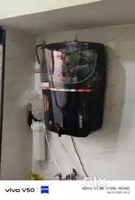 Desk with chair and RO Alkaline water filter