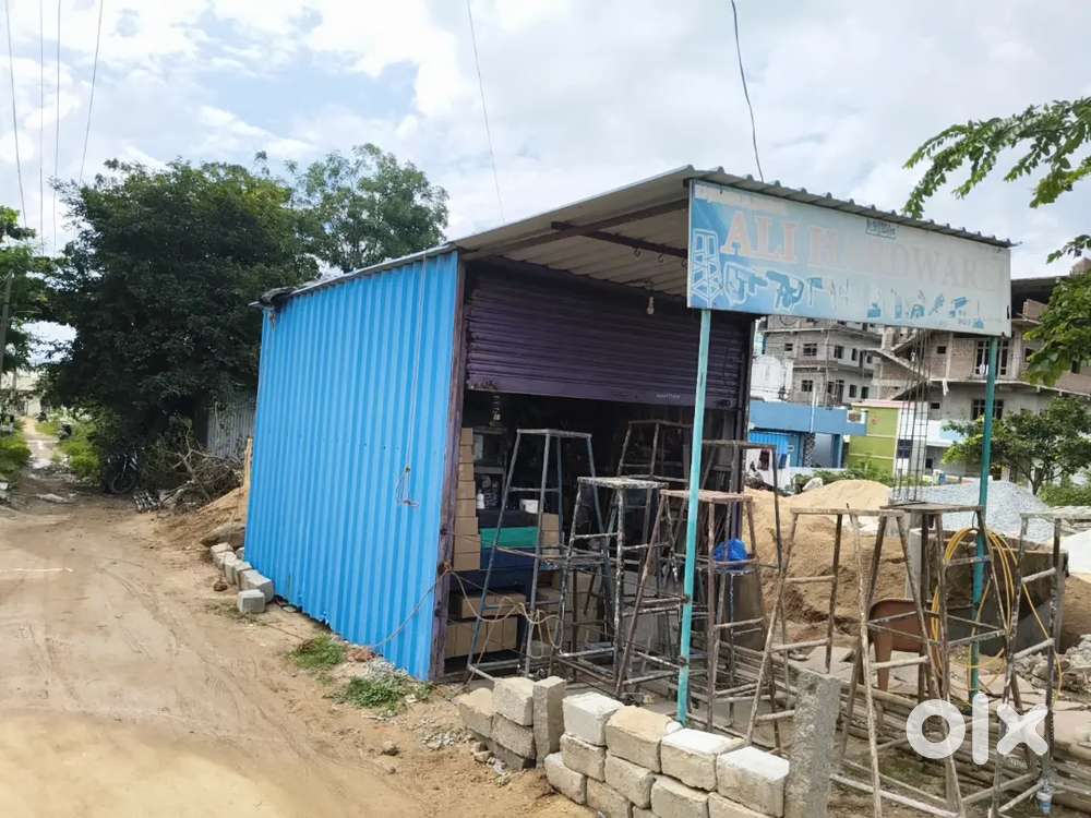 Blue metal sheet shop 15 feet long and 10 feet broad