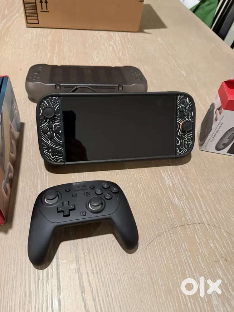 SWITCH 2 BUNDLE  Barely Used!  Pro Controller + Dbrand Killswitch