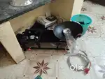 Still gas stove and irumbu kadaai with chainese karandi