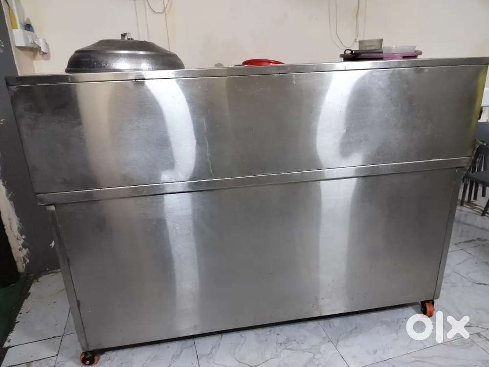 Stainless steel counter table , 4 Wall Fans & 10 chairs with 4 tables