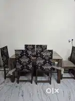 Six seater sheesham dining table with table and chair covers
