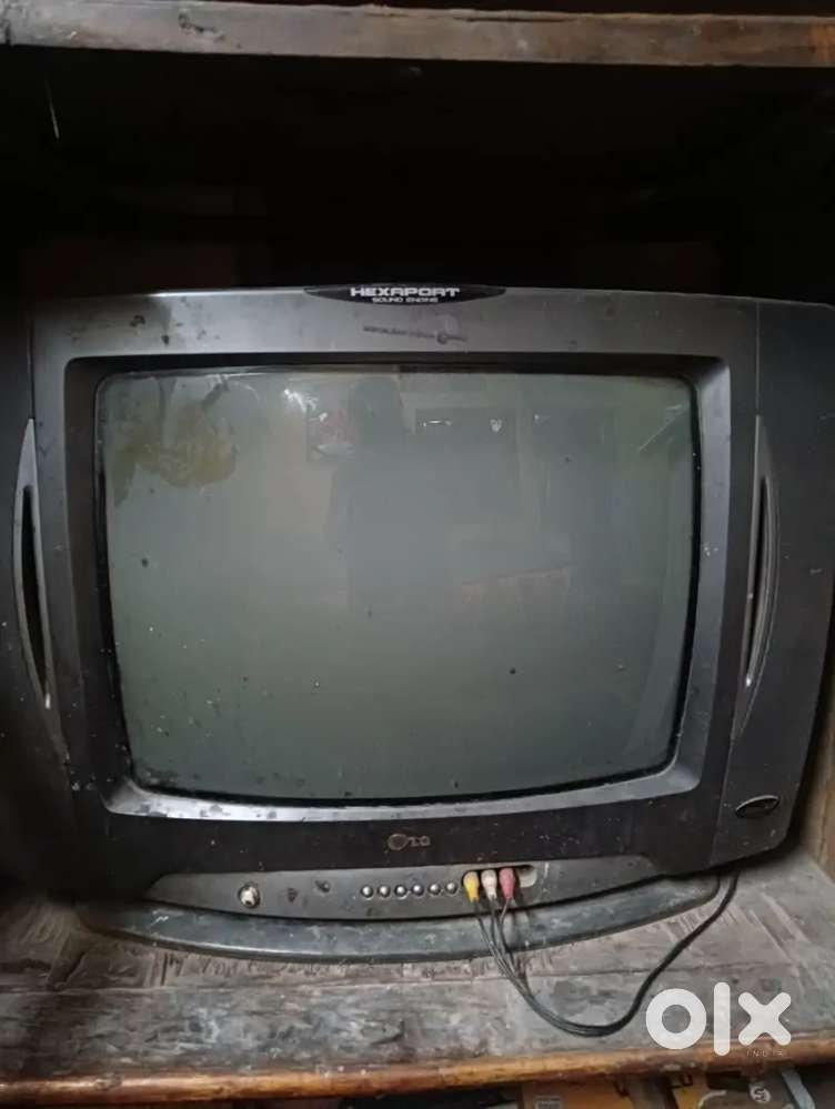 The image shows a cathode-ray tube (CRT) television. 