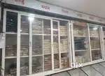 Showcases with sliding glass doors