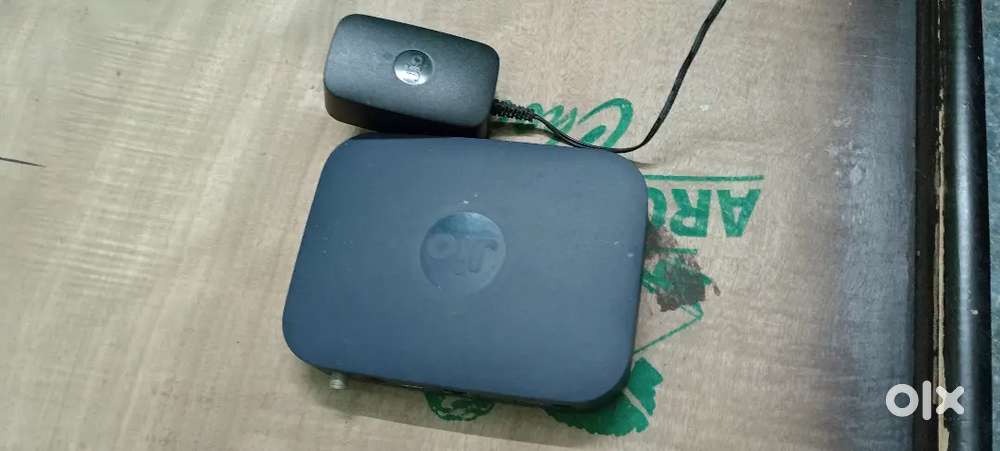 Jio setup box with adapter and and remote