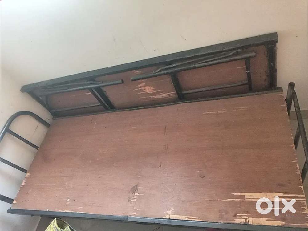 Two Iron and plywood beds