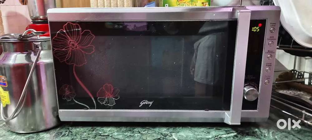 Godrej Convection Microwave oven with girll