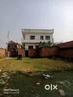 Kazaq pura se 100 meter andar  road pe zameen hai koniya bagaicha