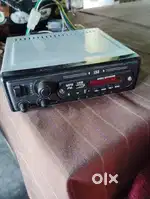 Car stereo with basstube adapter