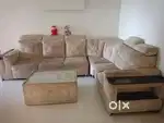 Corner sofa with center table