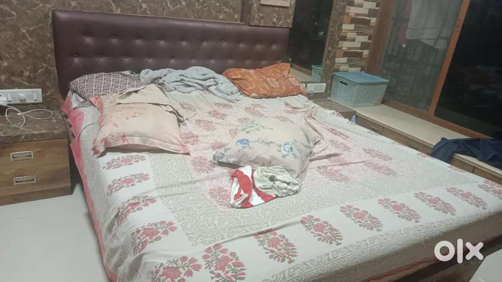 Double cot bed with hydrolic storage and two side table