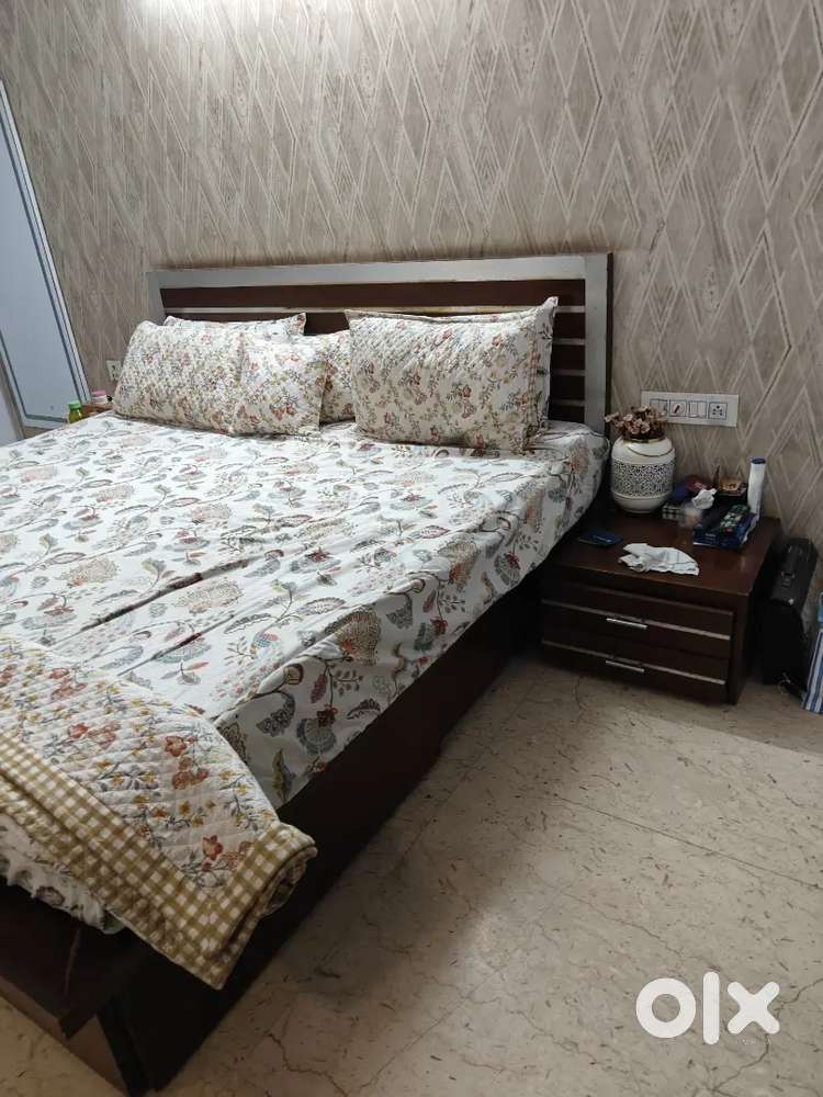 Luxurious bed with side tables