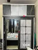 Wardrobe with upper storage