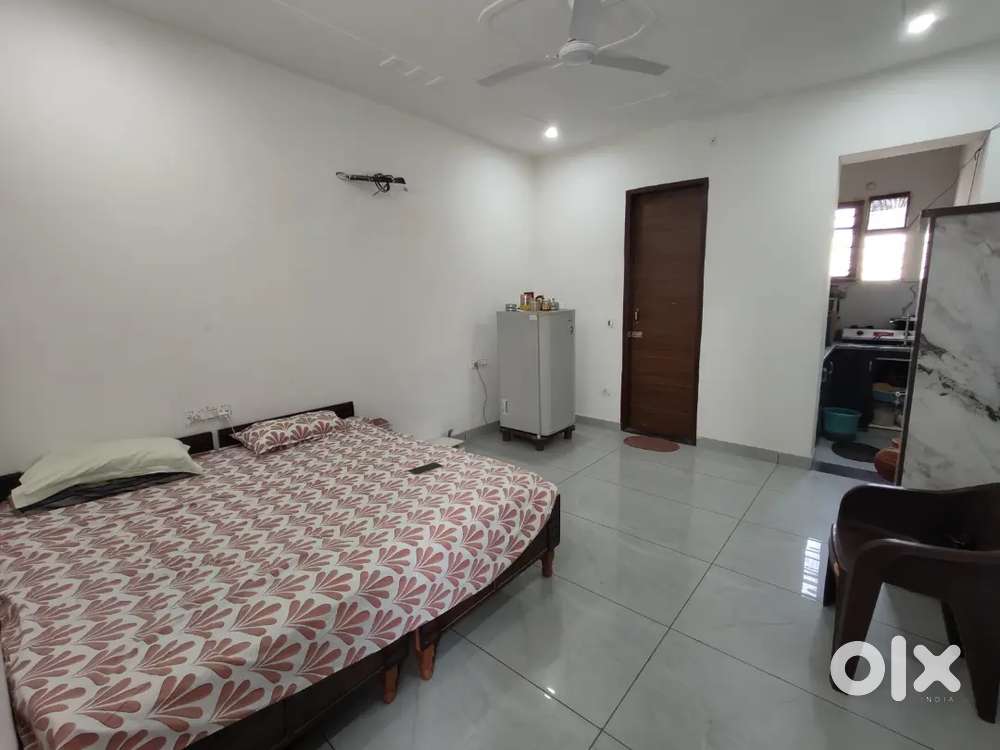 Single semi furnished room for rent in reputed society