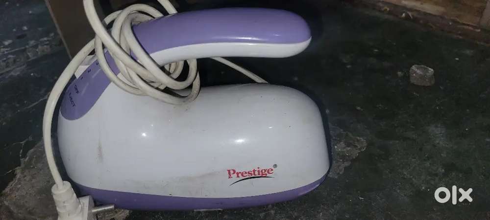 New prestige hand mixer and one old electric toaster