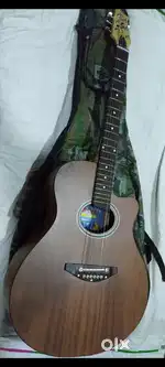 Acoustic guitar with bag