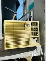 One tan window AC