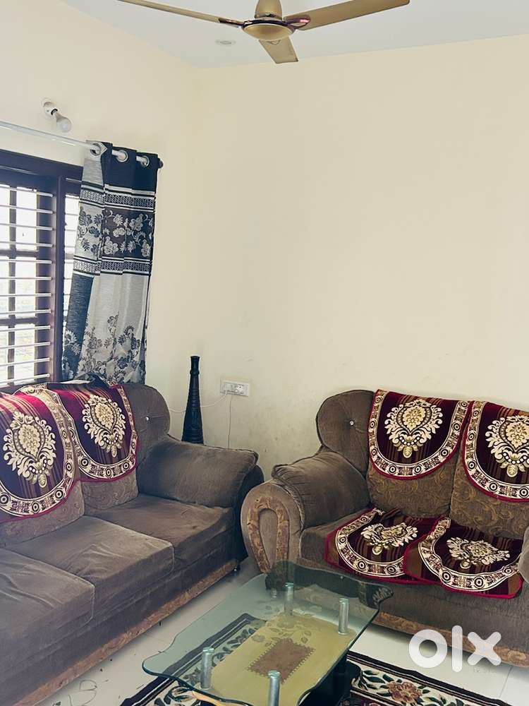 5seater sofa nd teakwood showcase