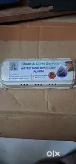 Water tank overflow alarm