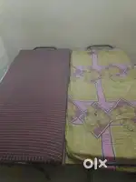 3 folding beds with mattresses