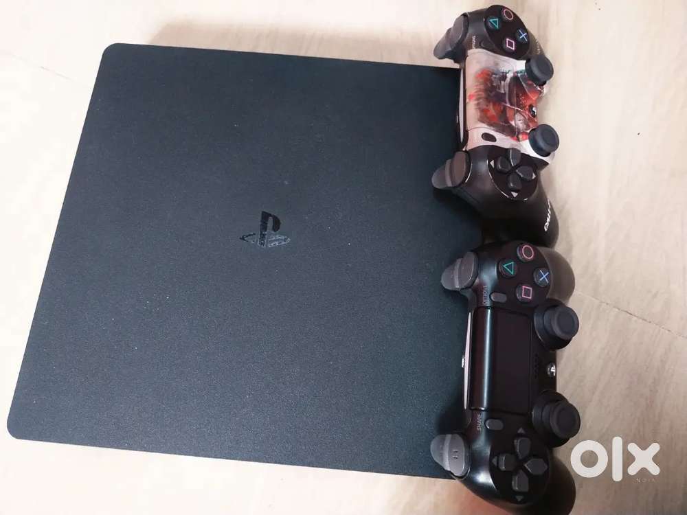 PS4 Slim 1TB + 2 Controllers  Excellent Condition  Fully Working