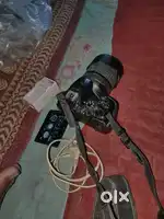 Nikon 5600d battery charger sath mein